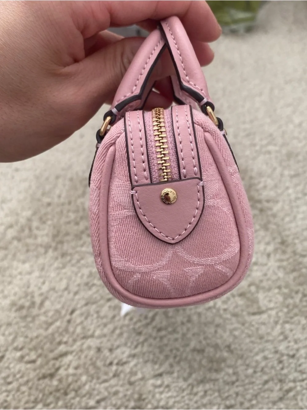 coach pink denim rowan charm